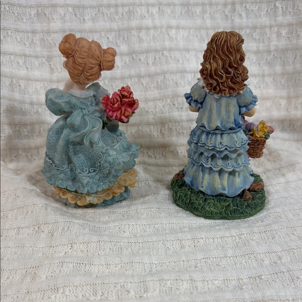 Charming Figurine Set with Blue and Pink Accents